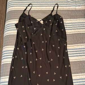 Silky Black Spaghetti Strap Dress with Tan Bow Pattern